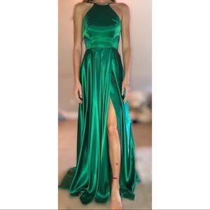 Emerald green prom dress with a slit